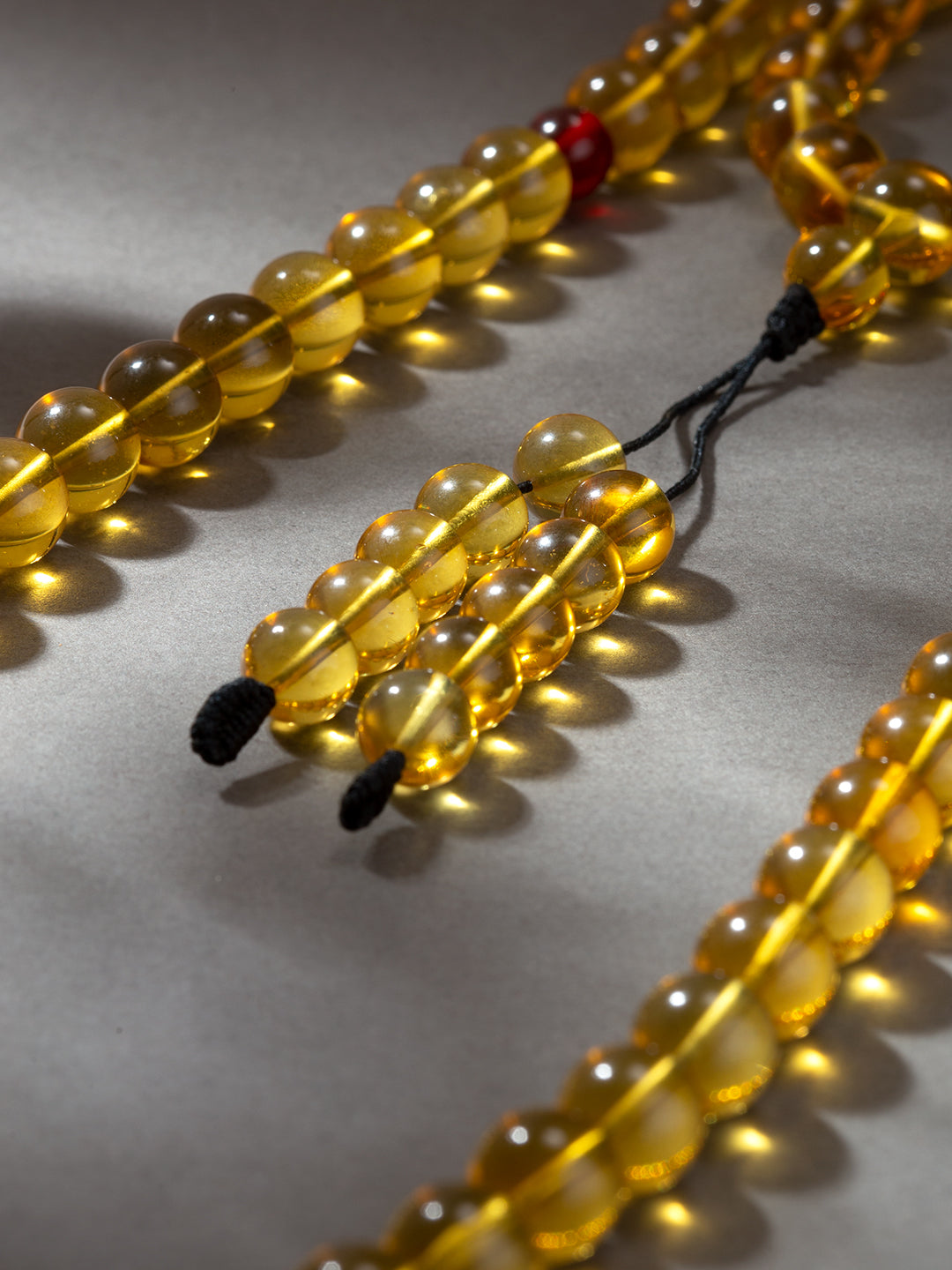 Burmese Golden-Blue Amber 108-Bead Mala · 9.5 mm