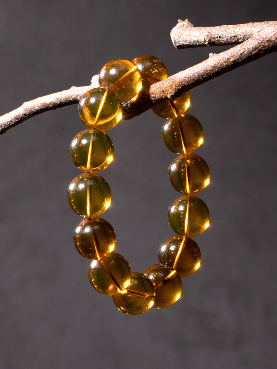 Golden-Blue Amber Bracelet · 14 mm