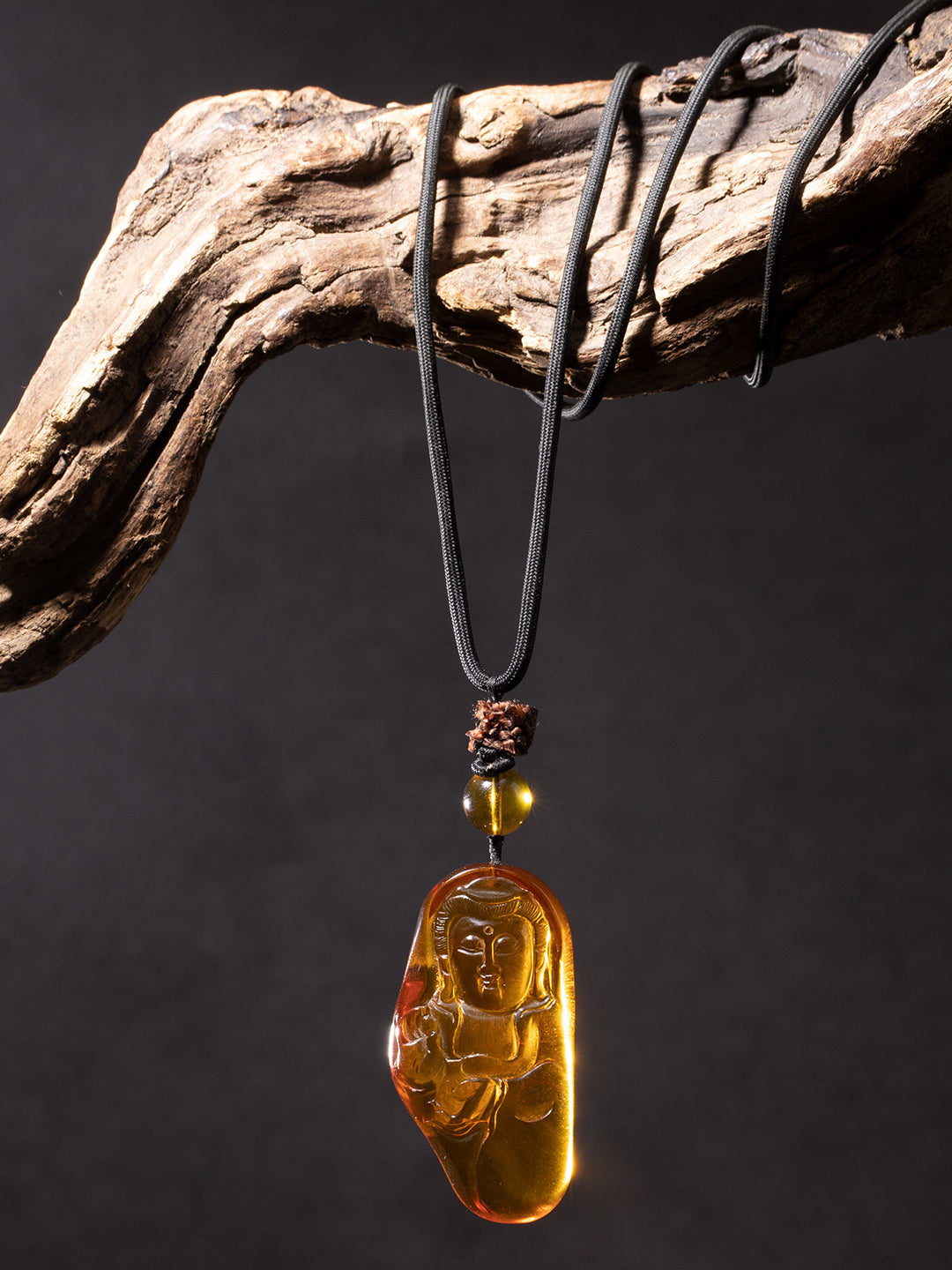 Freeform Amber Buddha Pendant